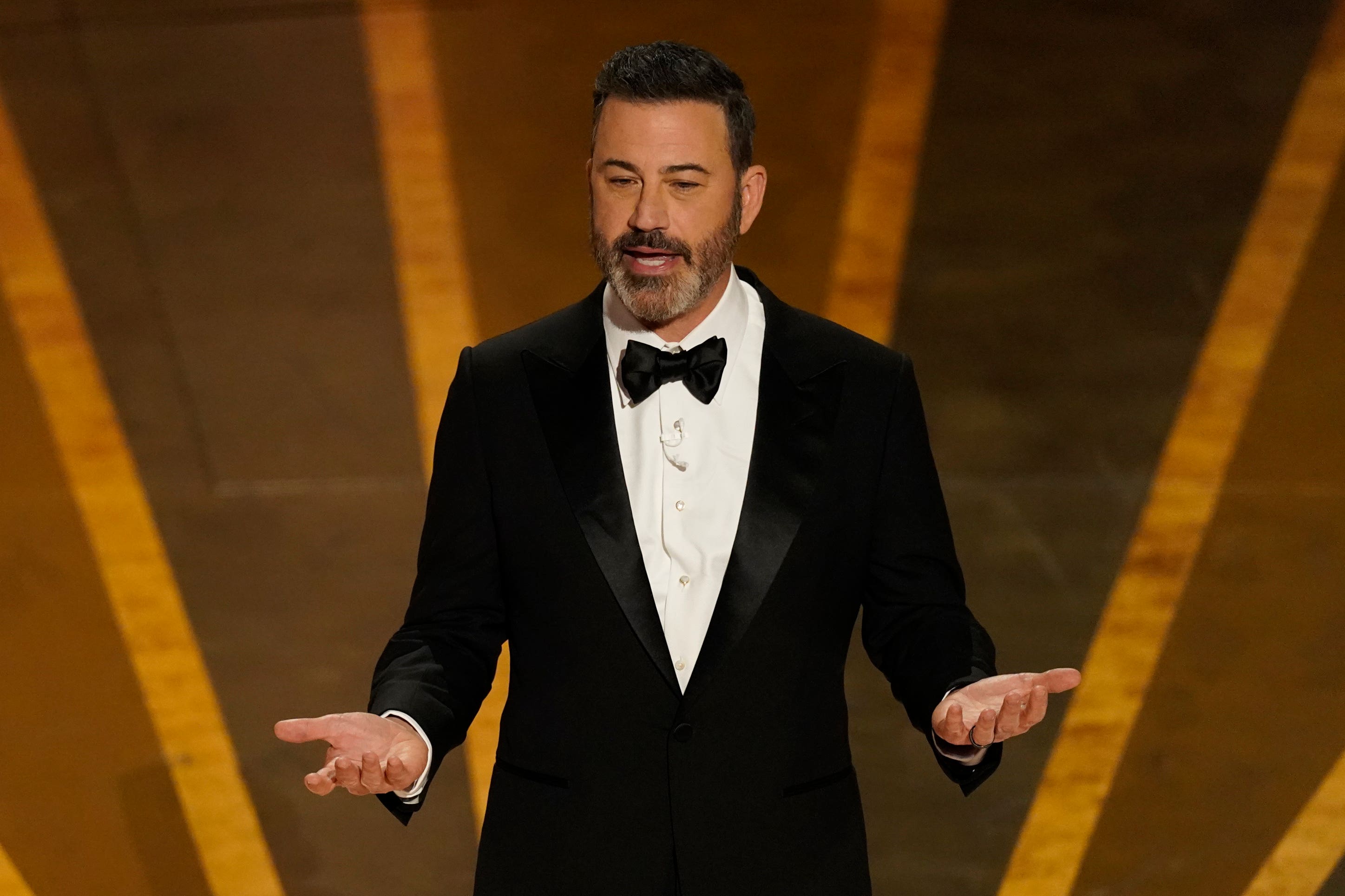 Host Jimmy Kimmel speaks at the Oscars on Sunday, March 12, 2023, at the Dolby Theatre in Los Angeles (Chris Pizzello/AP)