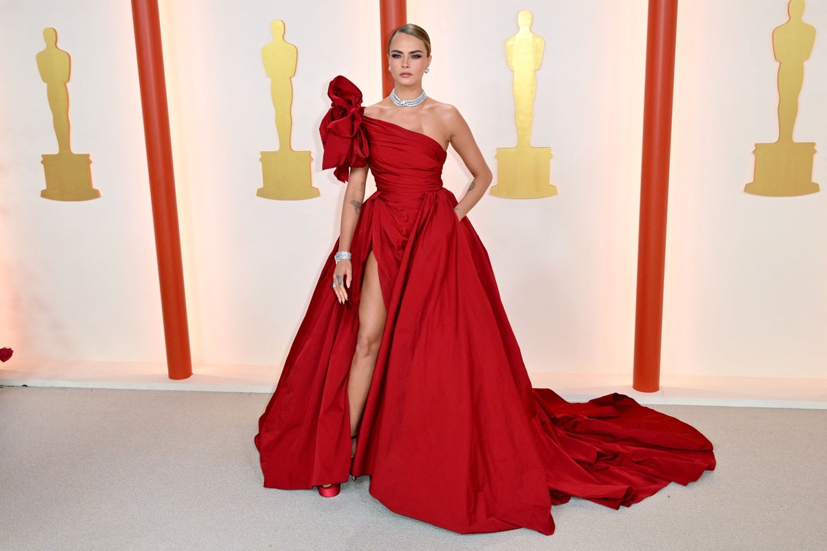 Fans applaud Cara Delevingne for Oscars appearance days after admitting paparazzi photos drove her to rehab