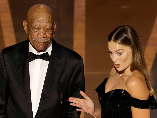 <p>Morgan Freeman and Margot Robbie speak onstage during the 95th Annual Academy Awards at Dolby Theatre on March 12, 2023 in Hollywood, California. (Photo by Kevin Winter/Getty Images)</p>