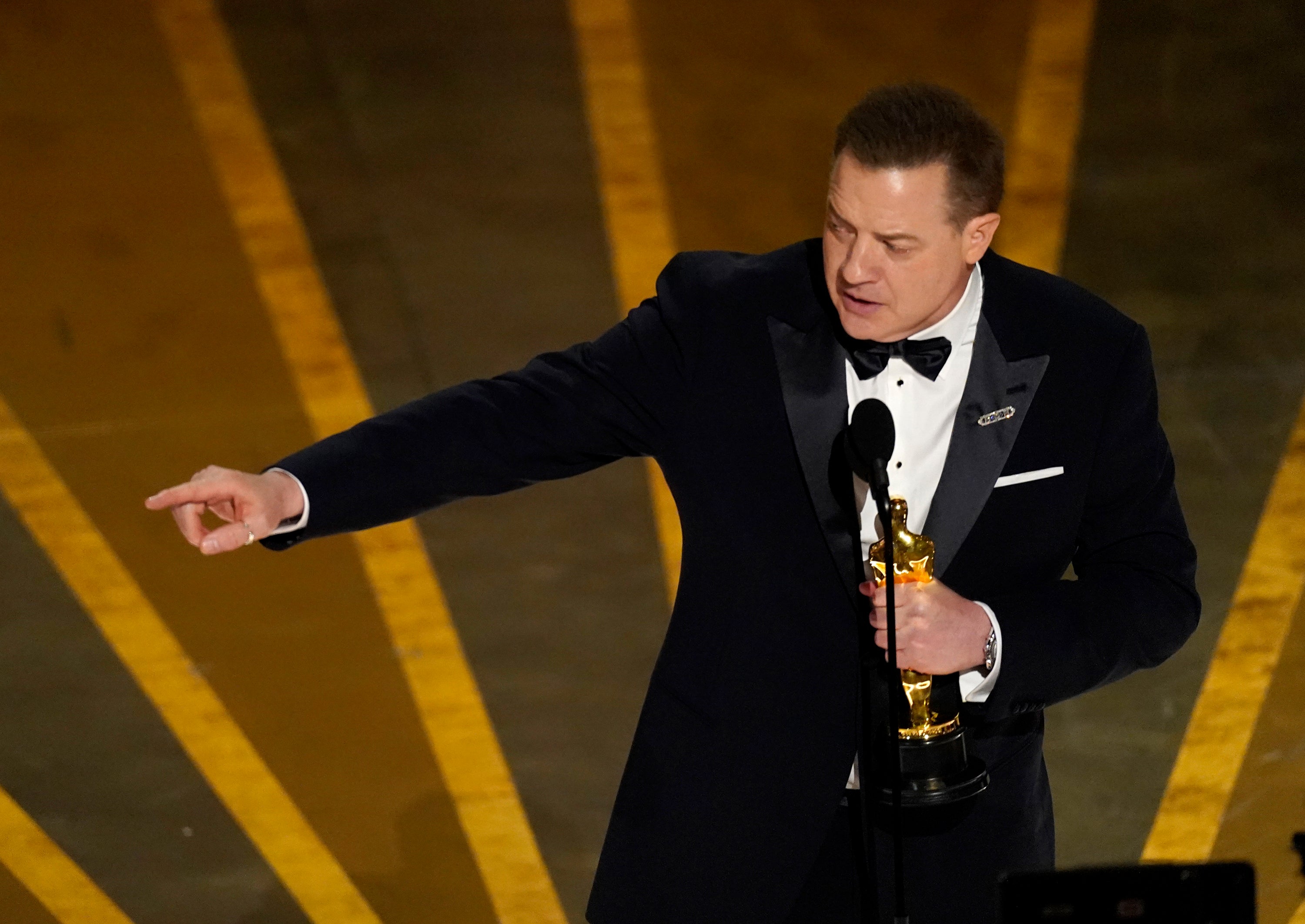 Fraser accepts his Best Actor Oscar