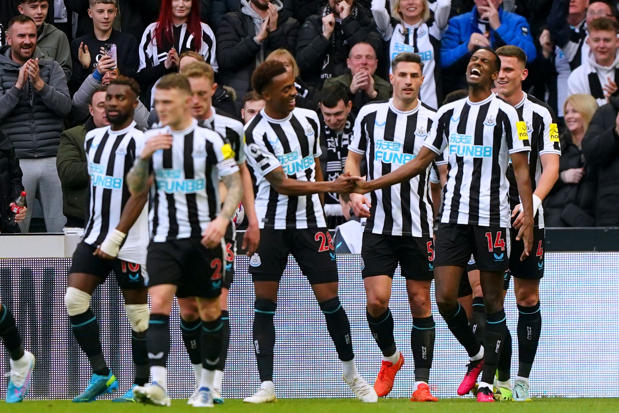 Newcastle’s Alexander Isak (second right) celebrates scoring the opening goal against Wolves (Owen Humphreys/PA)
