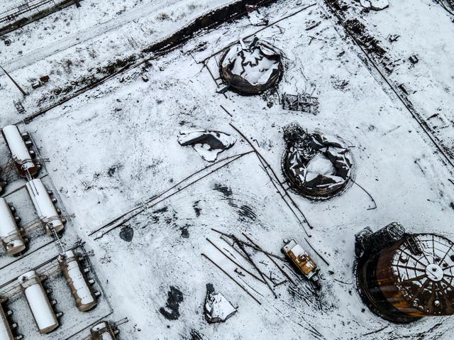 <p>An aerial photograph taken in December shows oil storage tanks that were hit by a Russian missile strike in Kryvyi Rih</p>