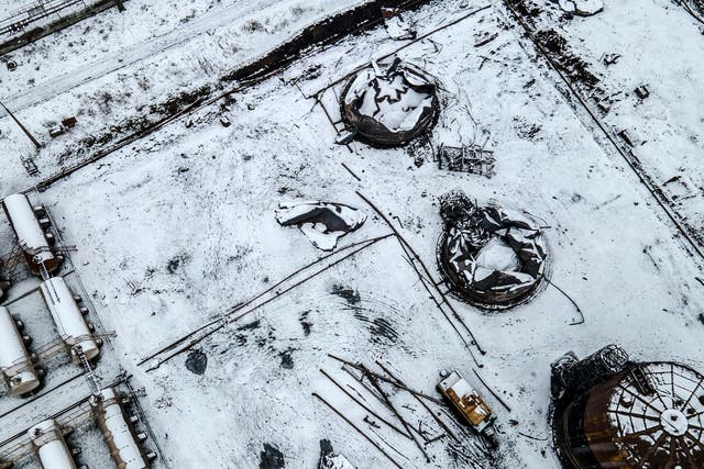<p>An aerial photograph taken in December shows oil storage tanks that were hit by a Russian missile strike in Kryvyi Rih</p>
