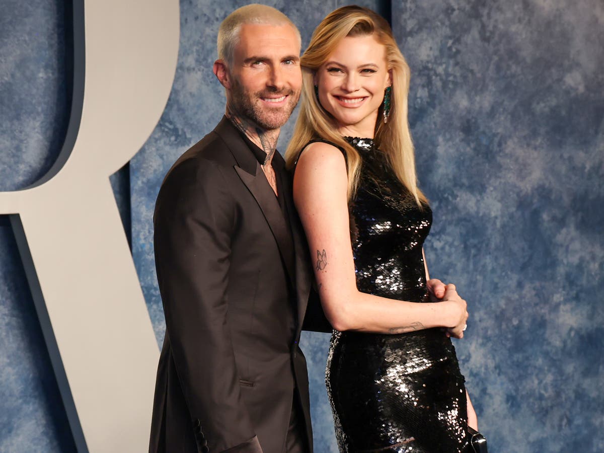 Adam Levine and Behati Prinsloo make first red carpet appearance at Oscars party following infidelity rumours