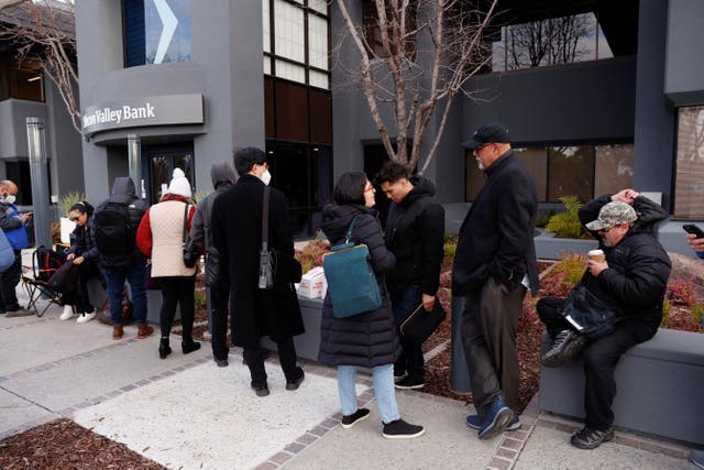 <p>Customers line up outside the Silicon Valley Bank headquarters in Santa Clara, California on Monday</p>