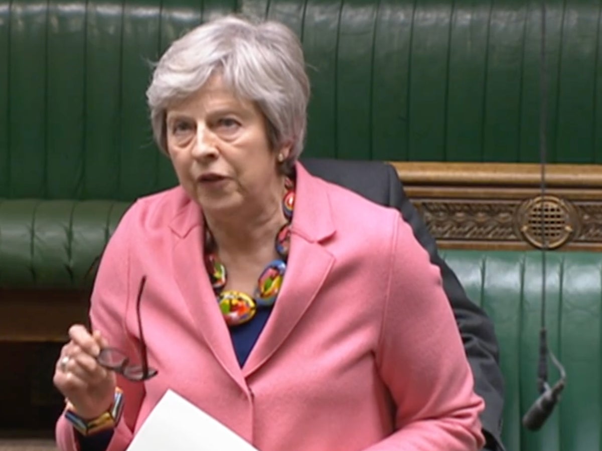 Theresa May says small boats bill ‘shuts door’ to trafficking victims as Tory backlash builds