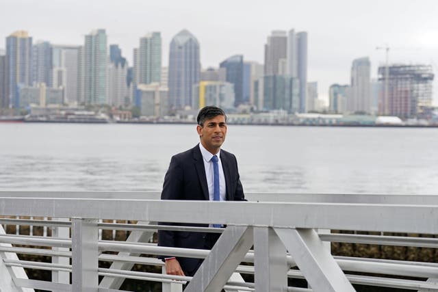 Prime Minister Rishi Sunak departs after taking part in media interviews at the harbour in San Diego (Stefan Rousseau/PA)