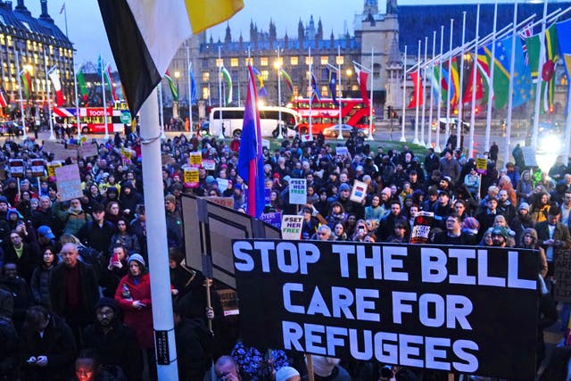 Demonstrators protesting against the Illegal Migration Bill in Parliament Square (Victoria Jones/PA Wire)