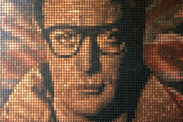 Coin mosaic of Sir Michael Caine in his 1960s film role of Harry Palmer (Ed Chapman/PA)