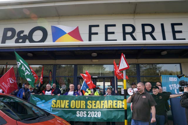 The RMT union is staging a protest in Westminster to mark the anniversary of the controversial sacking of hundreds of P&O workers (Andrew Milligan/PA)