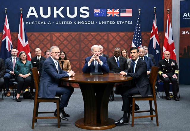 <p>From left, Anthony Albanese, Joe Biden and Rishi Sunak during the Aukus summit in San Diego on Monday</p>