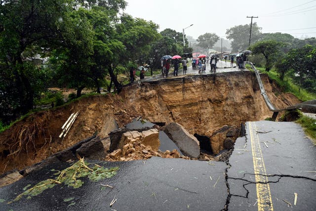<p>A road connecting the two cities of Blantyre and Lilongwe is following heavy rains caused by Tropical Cyclone Freddy in Malawi </p>