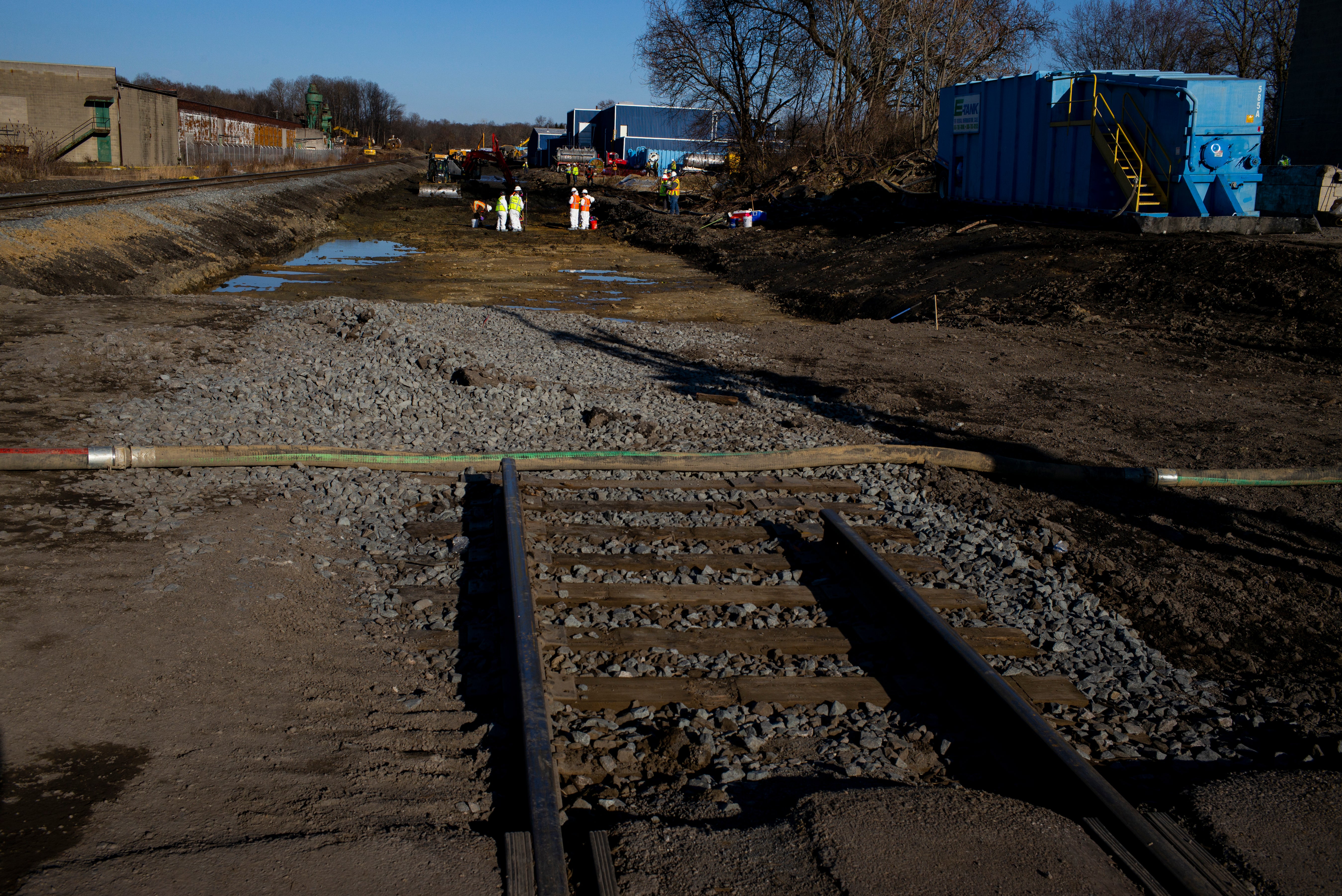 <p>Ohio EPA and EPA contractors collect soil and air samples from the derailment site on March 9, 2023 in East Palestine, Ohio</p>