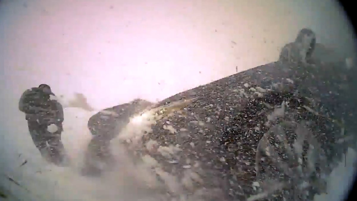 Moment police officer hit by car in snowy conditions caught on bodycam
