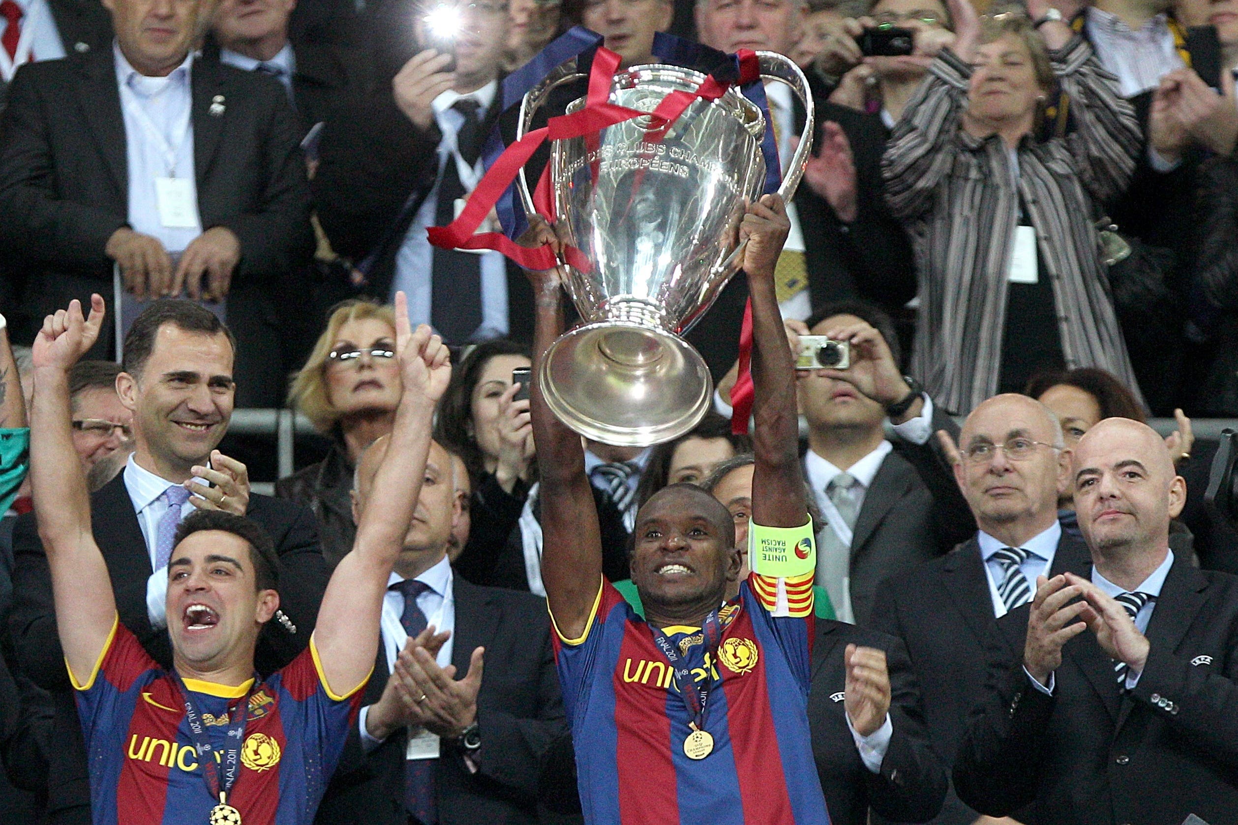 Eric Abidal lifts the Champions League trophy in 2011 (Nick Potts/PA)