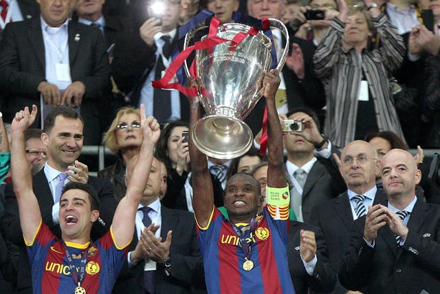 Eric Abidal lifts the Champions League trophy in 2011 (Nick Potts/PA)