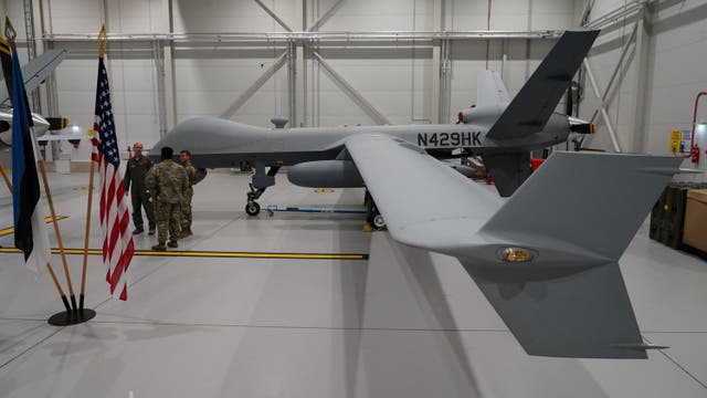 <p>A US Air Force MQ-9 Reaper drone sits in a hanger at Amari Air Base, Estonia</p>