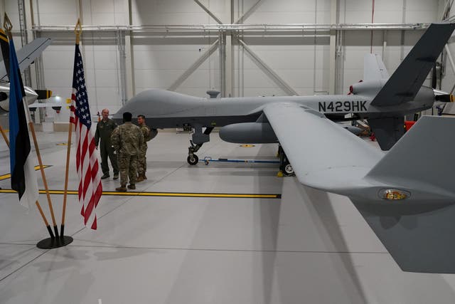 <p>A US Air Force MQ-9 Reaper drone sits in a hanger at Amari Air Base, Estonia</p>
