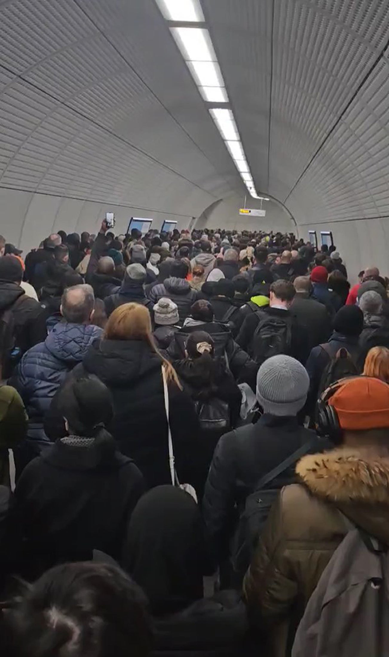 A screengrab taken with permission of commuters at Tottenham Court Road underground station at 8am on Wednesday 15 March, as industrial action closed the London Underground network