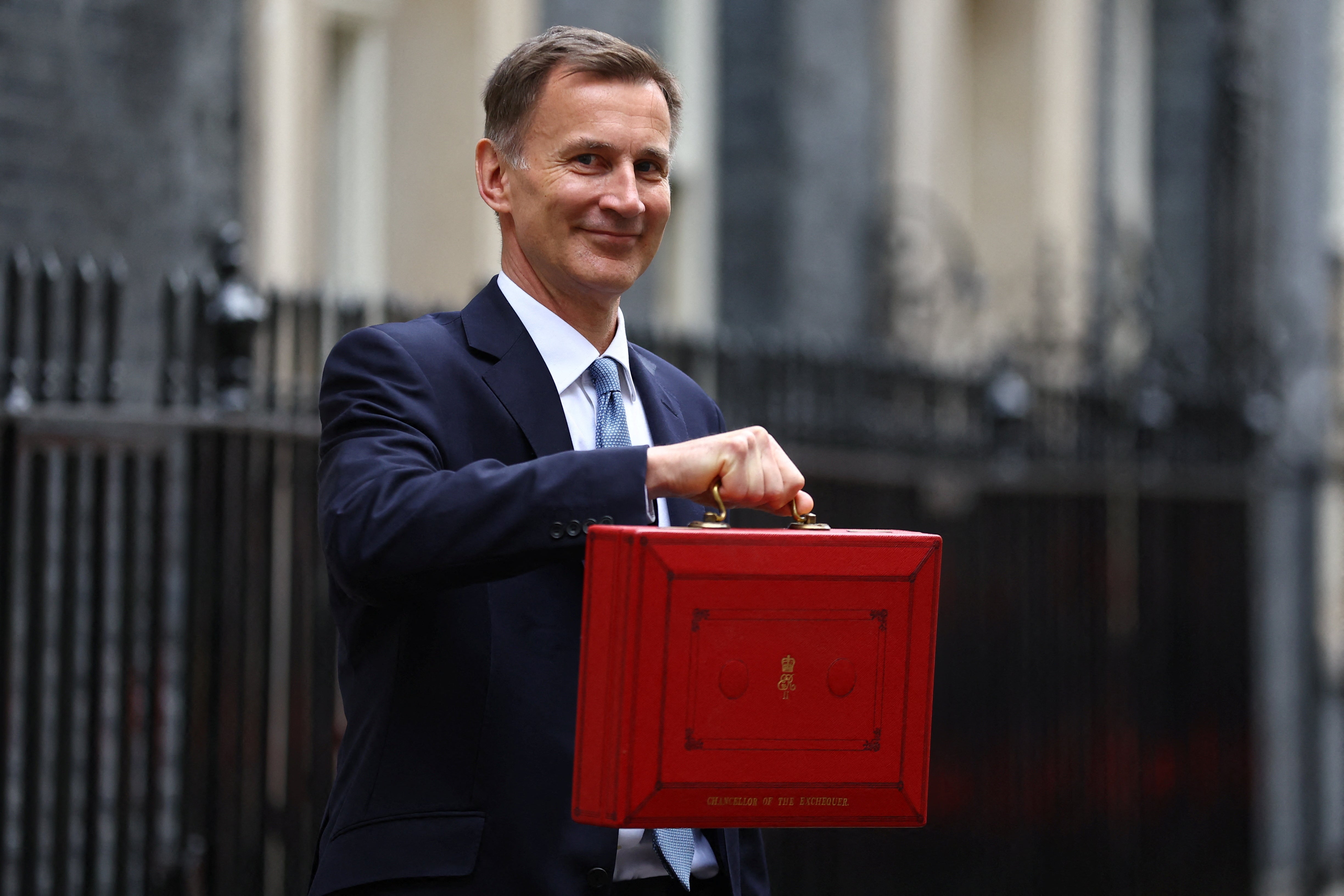 Jeremy Hunt leaving Downing Street to deliver the Budget