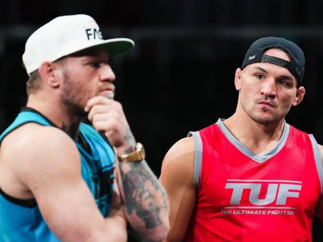 <p>Conor McGregor (left) and Michael Chandler</p>