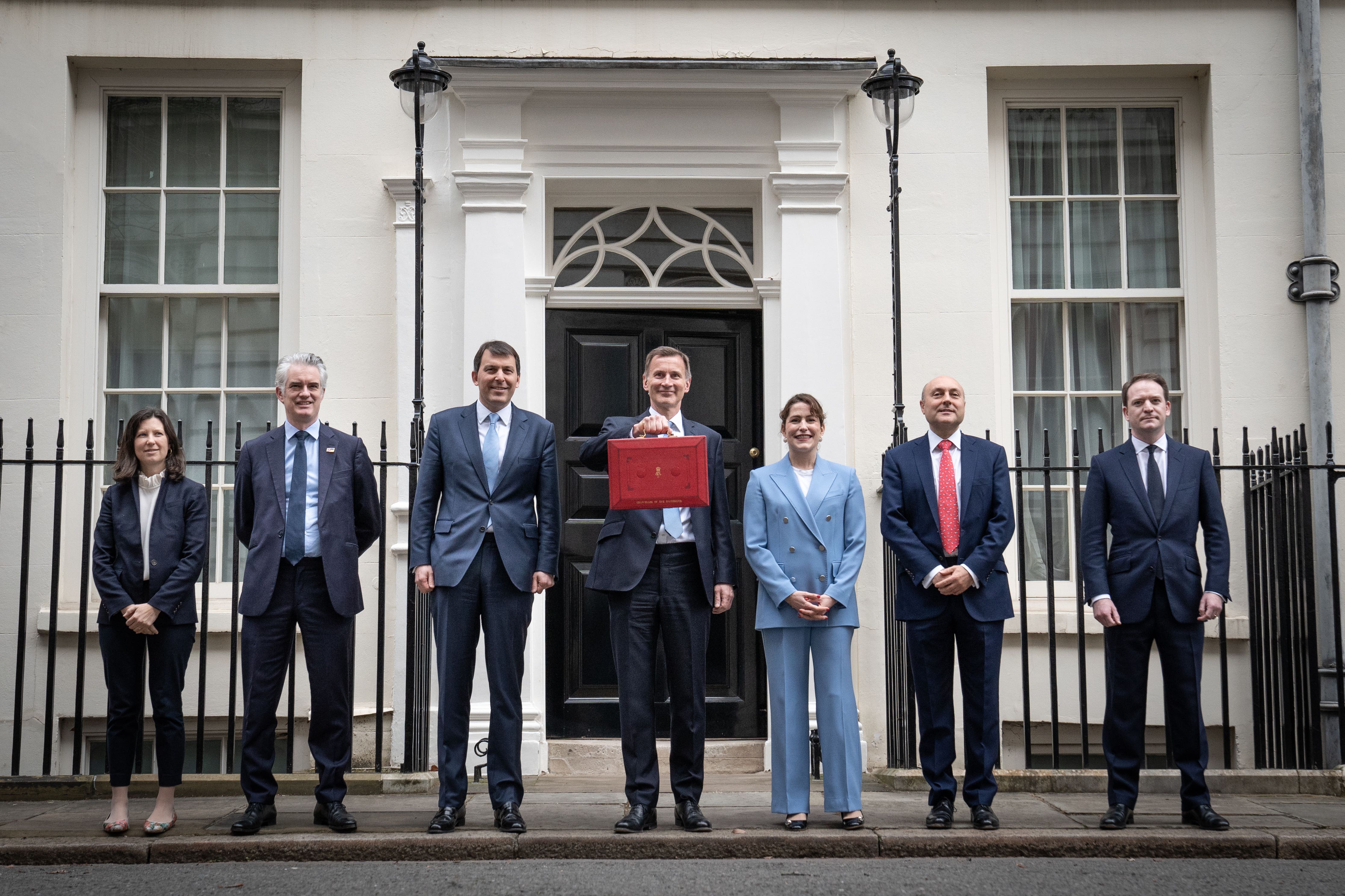 Chancellor of the Exchequer Jeremy Hunt outside 11 Downing Street with members of his ministerial team (Stefan Rousseau/PA Wire)