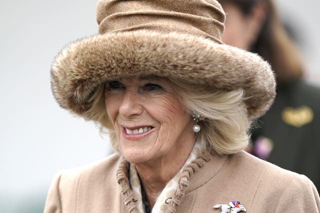 The Queen Consort arrives on day two of the Cheltenham Festival at Cheltenham Racecourse (Andrew Matthews/PA)