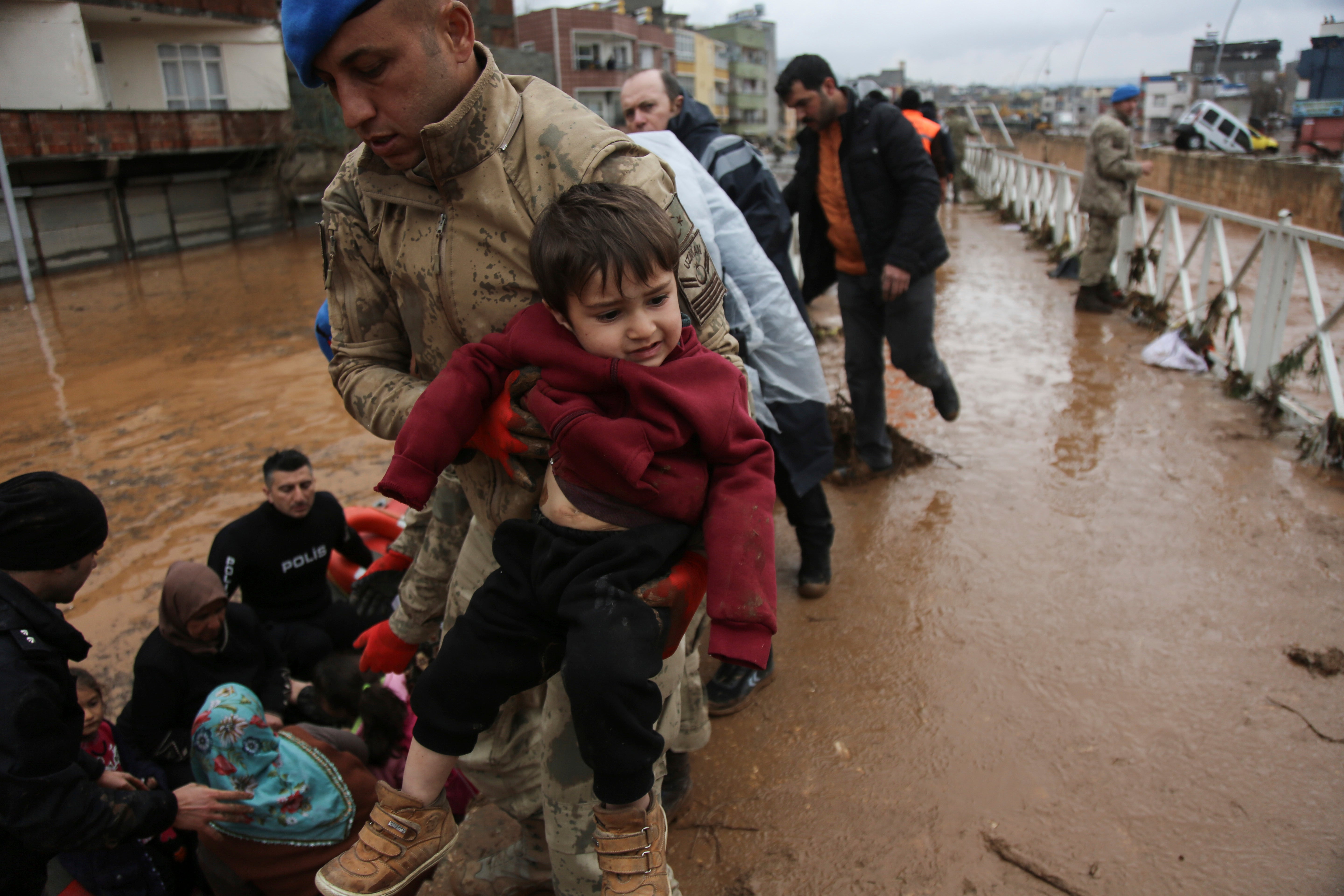 Soldiers helping to rescue flood victims in Sanliurfa, Turkey on Wednesday