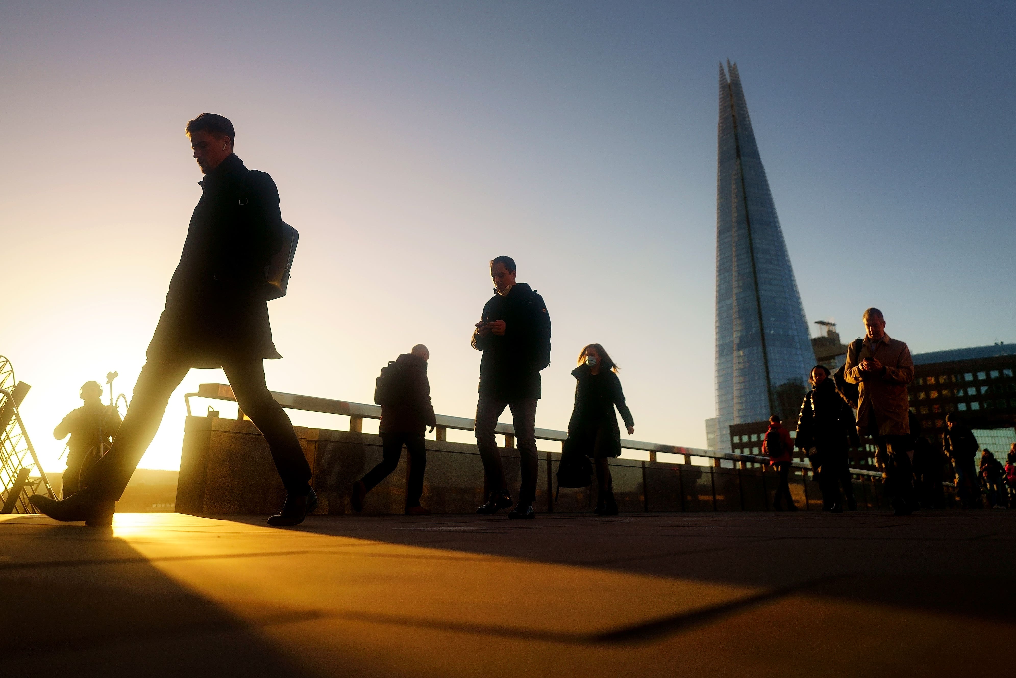 Commuters on London Bridge (Victoria Hones/PA)