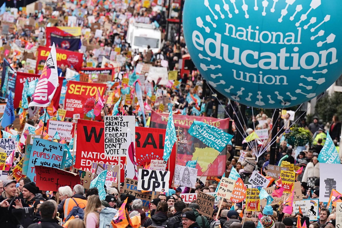 Thousands of striking workers march through central London on Budget Day