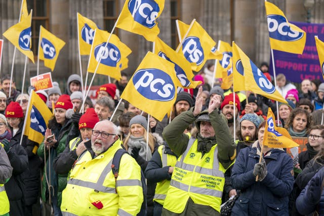 PCS members staged a rally as they walked out on strike (Jane Barlow/PA)