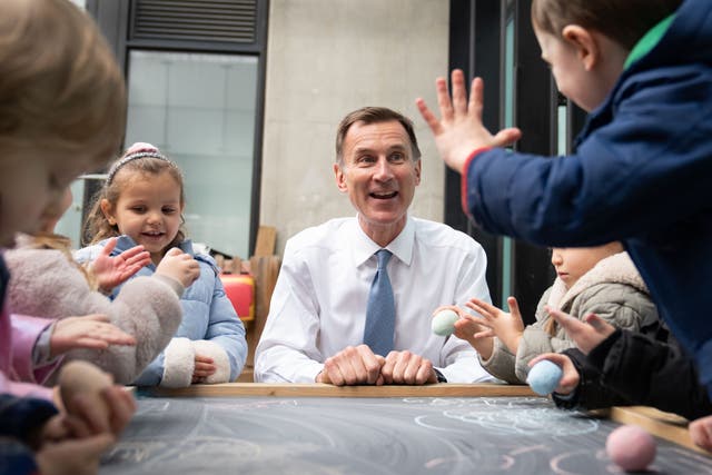 Chancellor Jeremy Hunt meeting children after unveiling his Budget (Stefan Rousseau/PA)