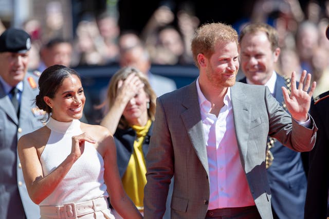 <p>Meghan and Harry arriving at the town hall for the Invictus Games Düsseldorf last year </p>