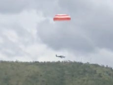 A plane parachutes to safety in Brazil on 11 March, 2023
