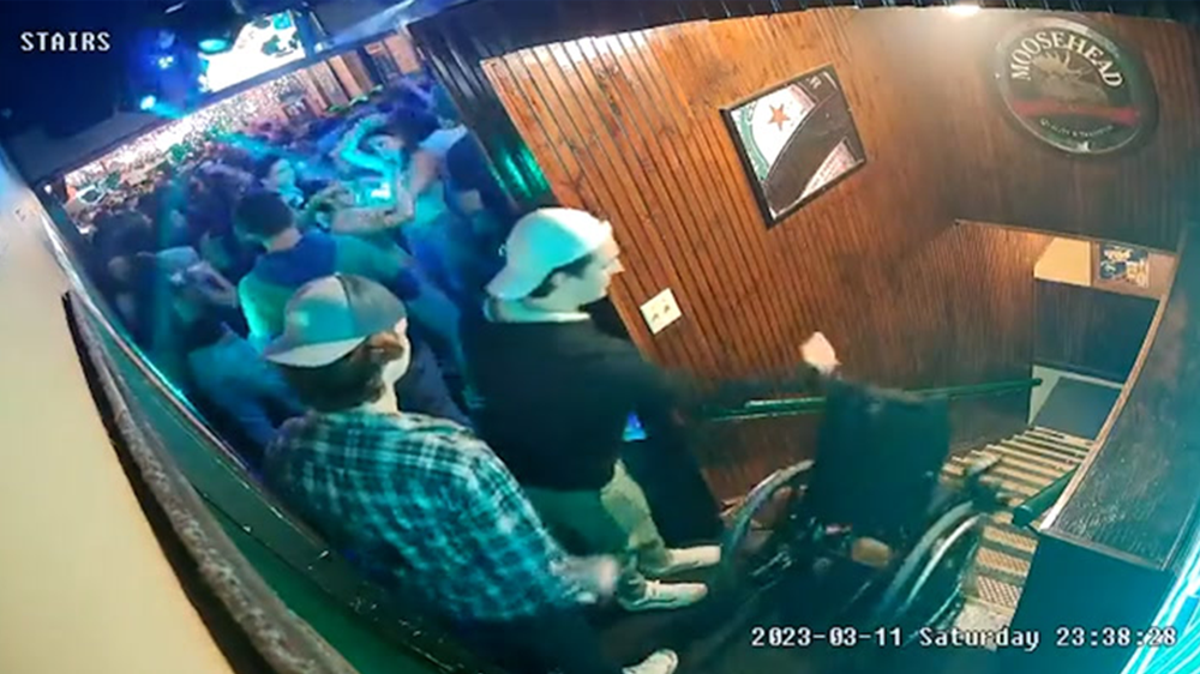 College student pushes bar-goer’s wheelchair down stairs in shocking CCTV footage