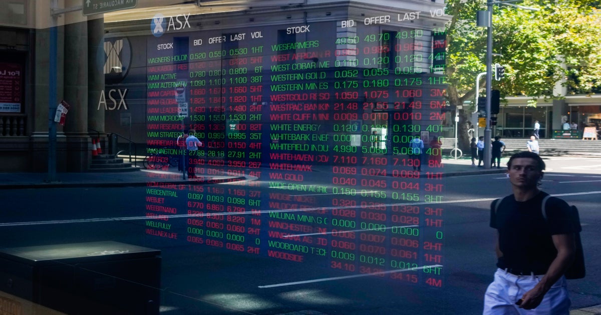 Asian stocks fall after Wall St sinks on new bank fears | The Independent