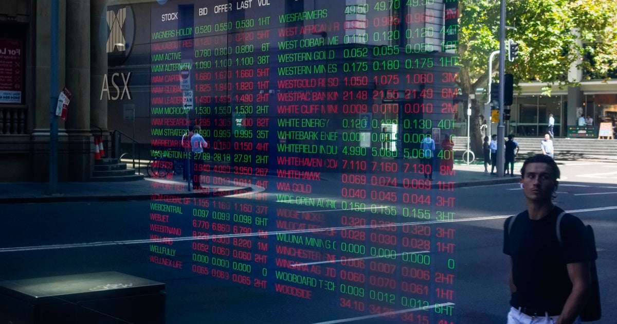 Asian stocks fall after Wall St sinks on new bank fears | The Independent