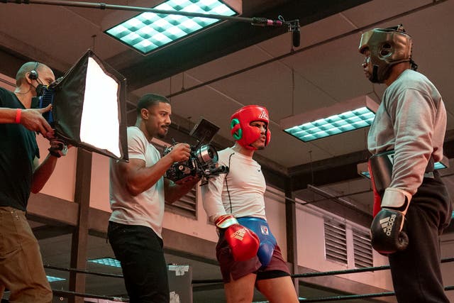 <p>‘Creed 3’ star and director Michael B Jordan (second left) with pro boxer Jose Benavidez Jr and Jonathan Majors (right) </p>