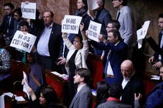 Macron forces plan to raise retirement age through French parliament without vote