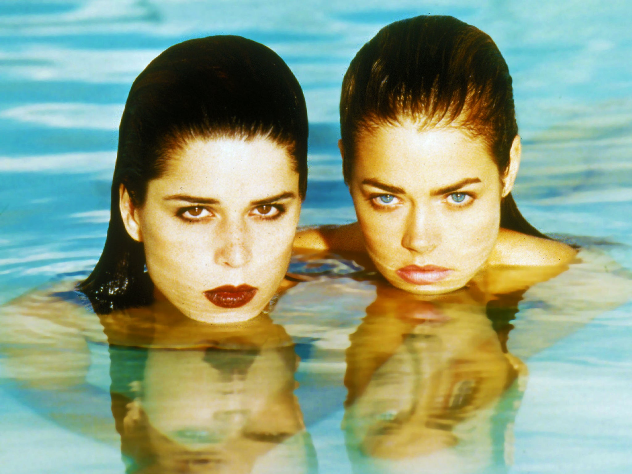 ‘It looks like they’re being exploited but they’re doing the exploiting’: Neve Campbell and Denise Richards in ‘Wild Things’