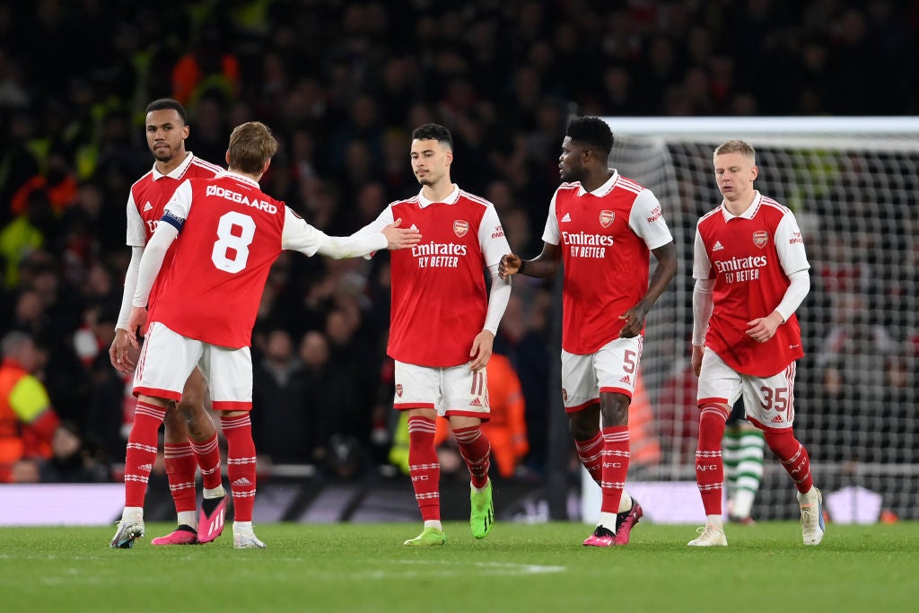 <p>Gabriel Martinelli is consoled by teammates after having his penalty saved by Sporting Lisbon golakeeper Antonio Adan</p>