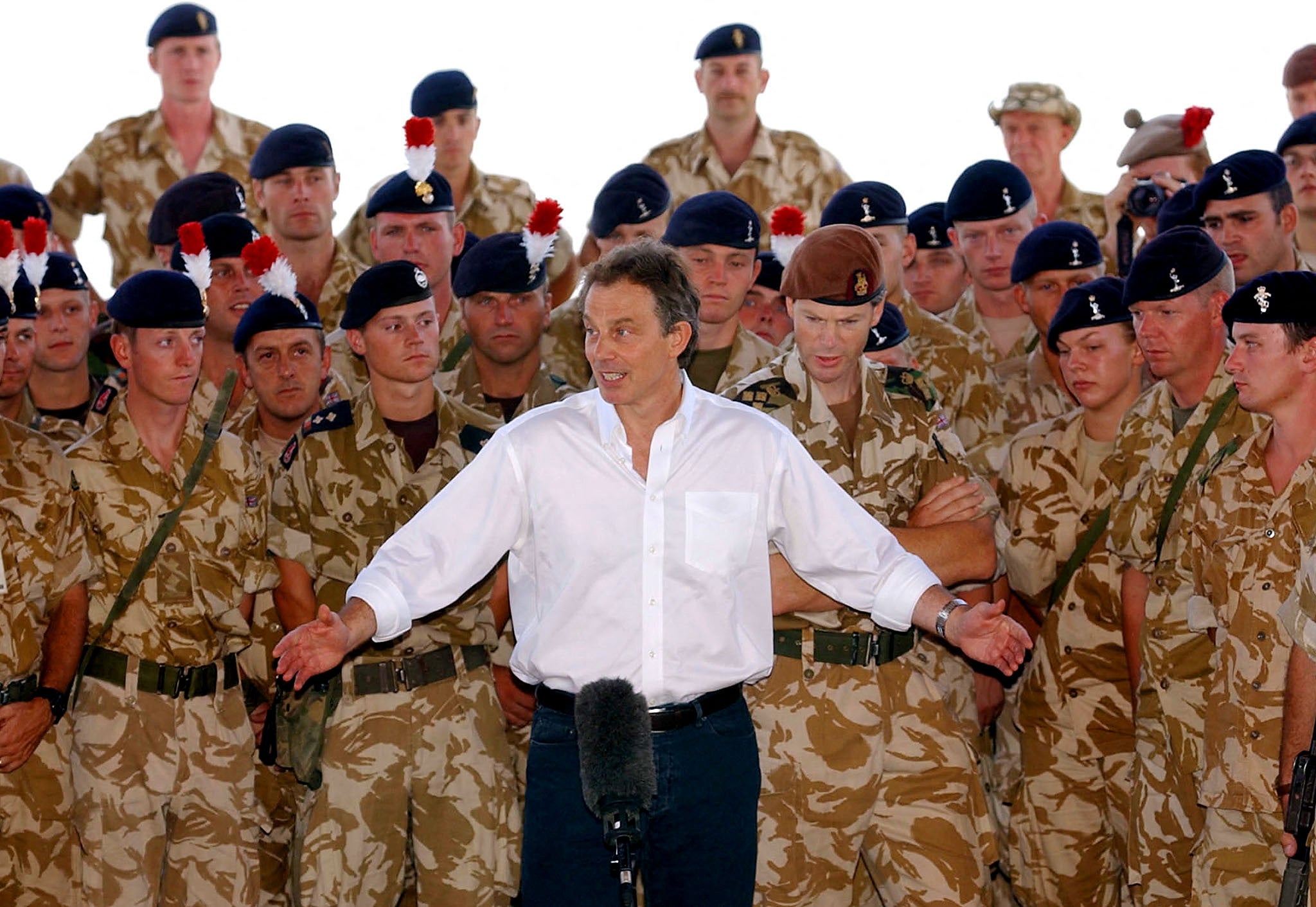 Britain's prime minister at the time Tony Blair addresses British troops in Basra, southern Iraq, May 29, 2003