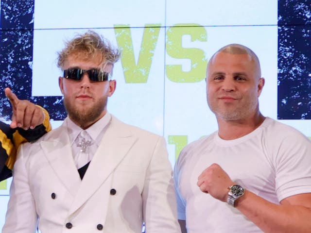 <p>BJ Flores (right) with Jake Paul in 2021</p>