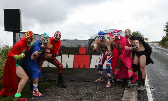 <p>The ‘Sheephouse Lane Wrestlers’ are a staple of Ironman UK. Somehow, in the profound depths of tiredness, I found the sight of them truly moving</p>