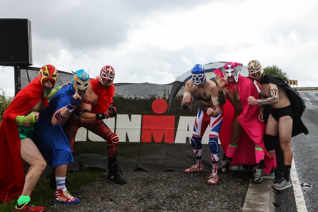 <p>The ‘Sheephouse Lane Wrestlers’ are a staple of Ironman UK. Somehow, in the profound depths of tiredness, I found the sight of them truly moving</p>