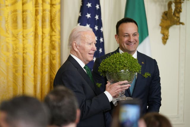 <p>Taoiseach Leo Varadkar presents US President Joe Biden with a bowl of Shamrock (Niall Carson/PA)</p>