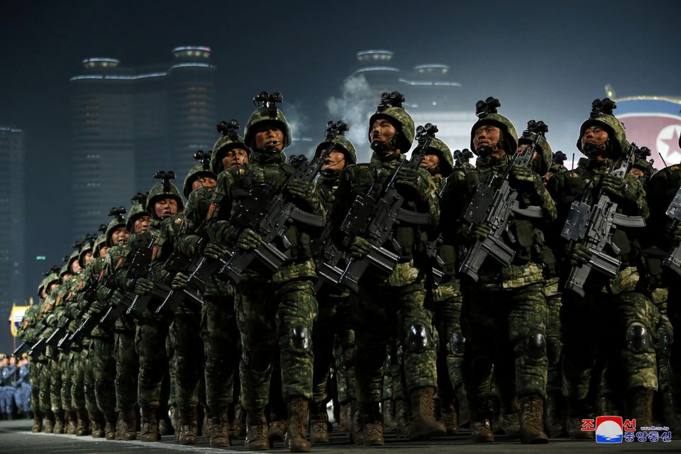 File: Troops take part in a military parade to mark the 75th founding anniversary of North Korea’s army, in Pyongyang, North Korea in February