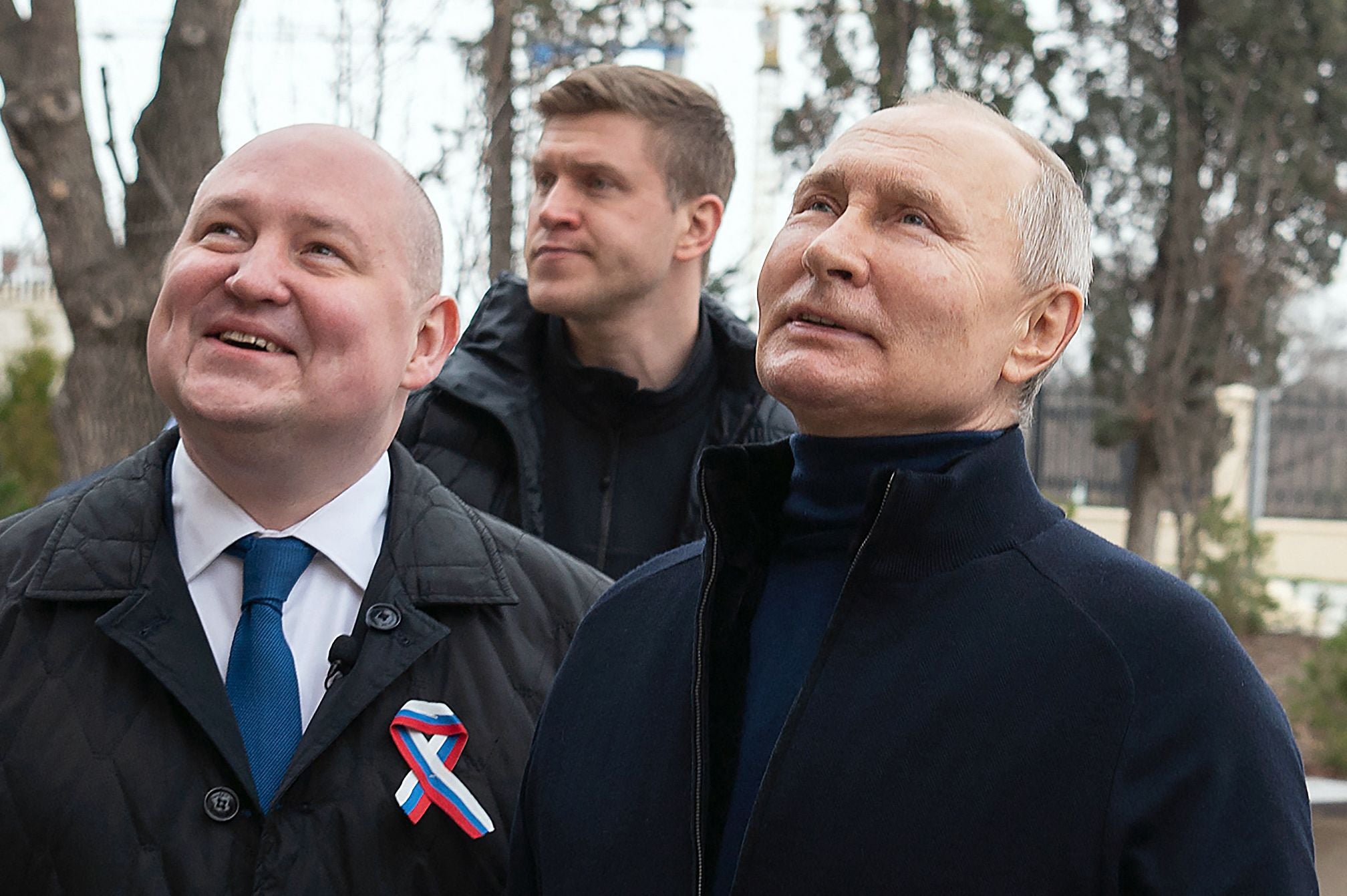Handout photograph taken and released by the Russian government shows Putin (right), with Governor Mikhail Razvozhayev at the Chersonesos Taurica historical and archeological park in Sevastopol