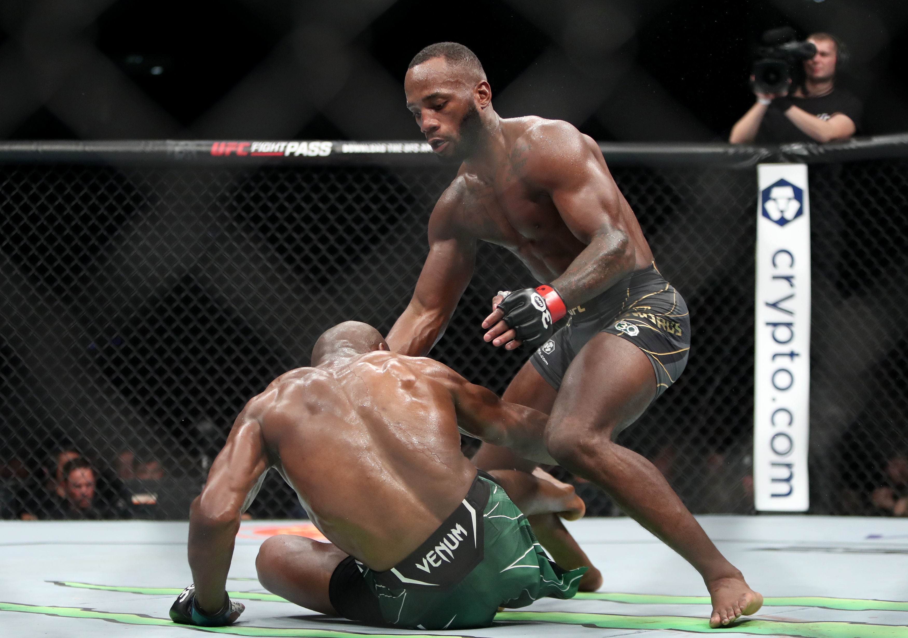 Leon Edwards (right) in his trilogy bout with Kamaru Usman in March