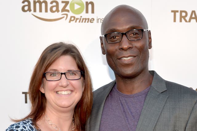 <p>Stephanie and Lance Reddick photographed in 2014</p>